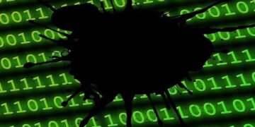Green binary code overlaid by a black splatter representing corruption and data risk, illustrating Unlock the Power: 7 Essential Benefits of Regular Website Backups.