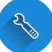 Unlock the Hidden Benefits of Regular Website Maintenance Today! Blue wrench on a circular blue background symbolizing technical maintenance and site upkeep.