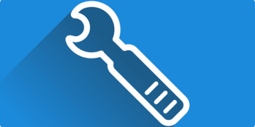 A blue circular icon with a white wrench and long shadow symbolizing site maintenance to Unlock 7 Essential Benefits of Regular Website Maintenance Today.