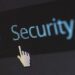 On-screen Security label with a pointing cursor illustrating Essential website security maintenance tips to protect your site.